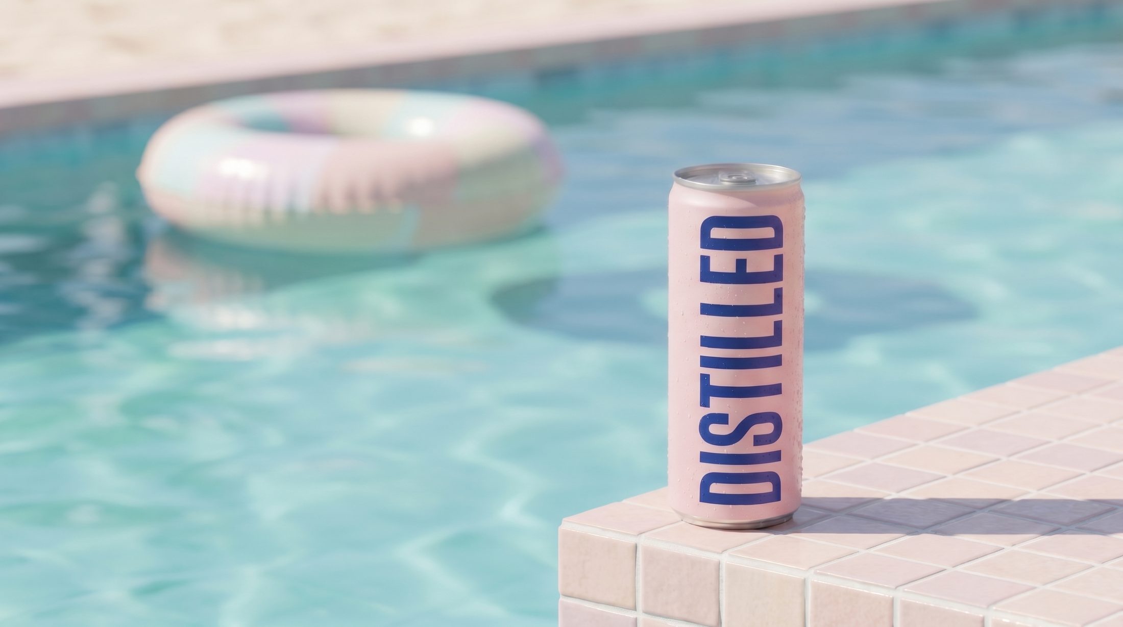 Distilled on a pastel poolside ledge with a life ring floating in turquoise water