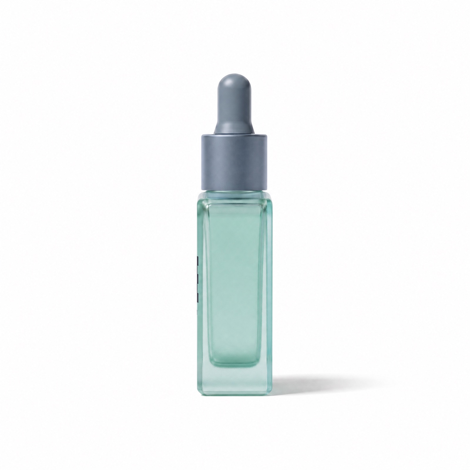 Side profile of the N&uacute;be serum bottle on white