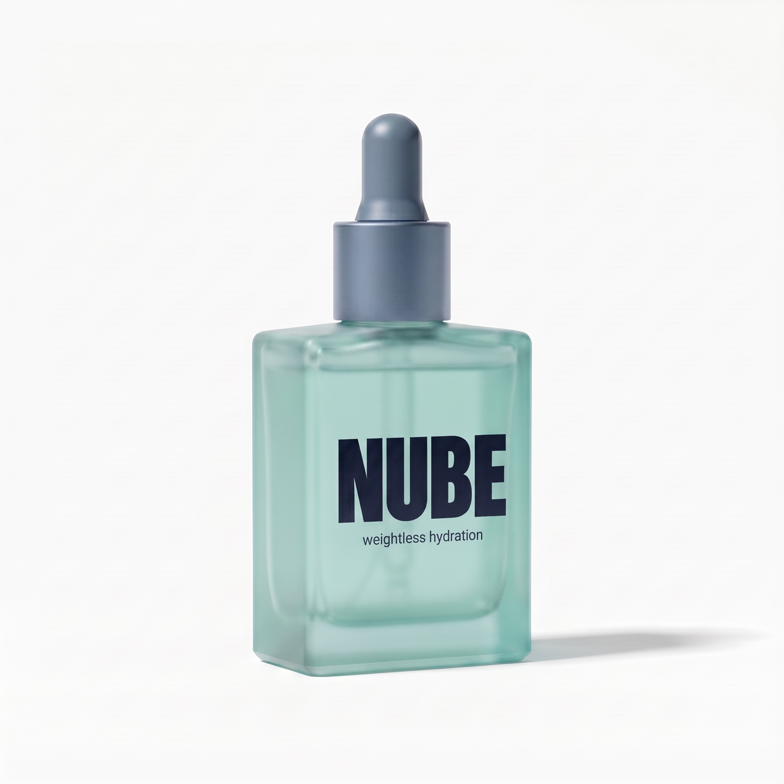The N&uacute;be serum bottle from a clean three-quarter angle on white