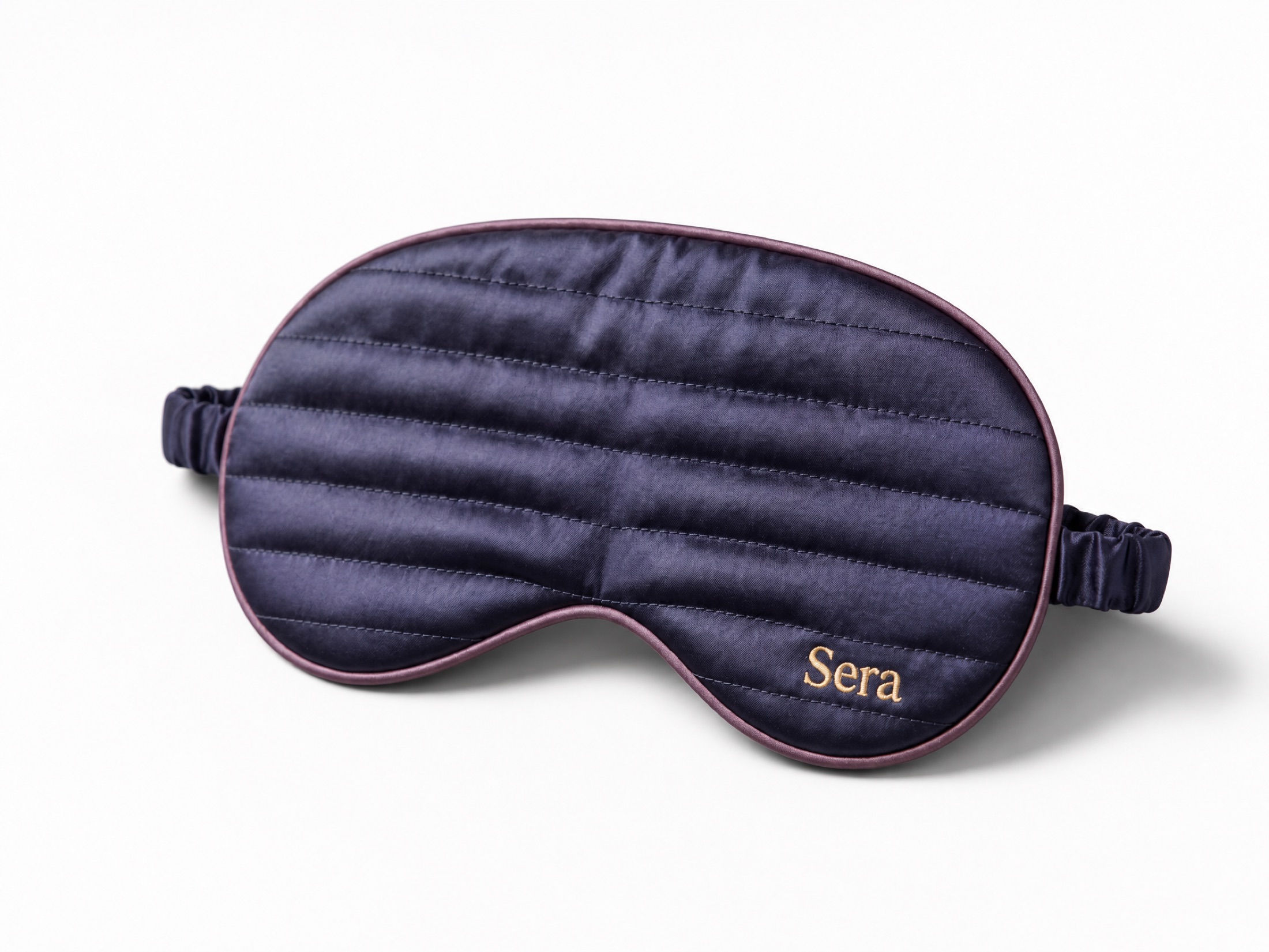 Three-quarter view of the Sera mask showing the padded quilting in relief