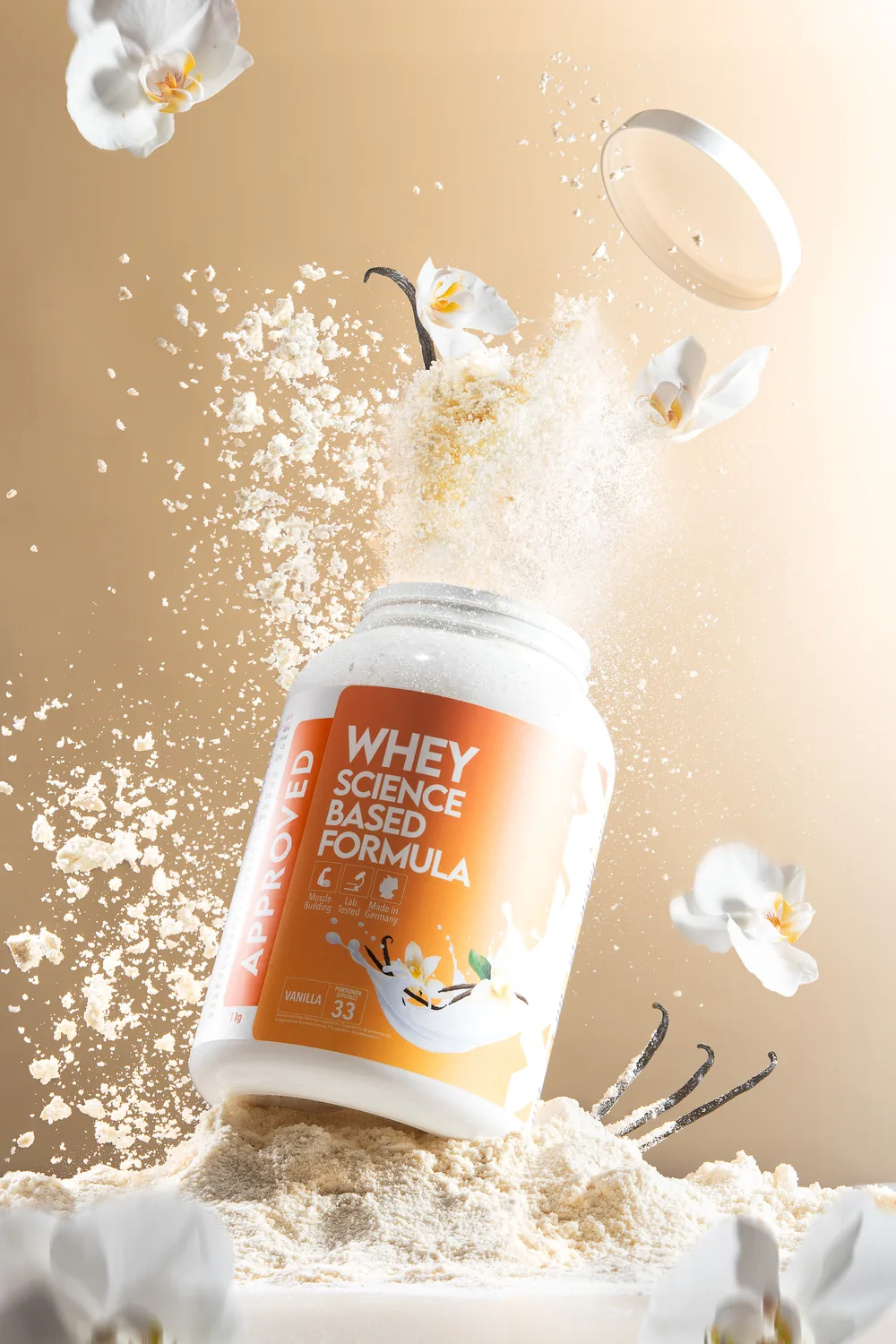 WFN whey protein tub suspended in an explosion of powder and white flowers on a warm background.
